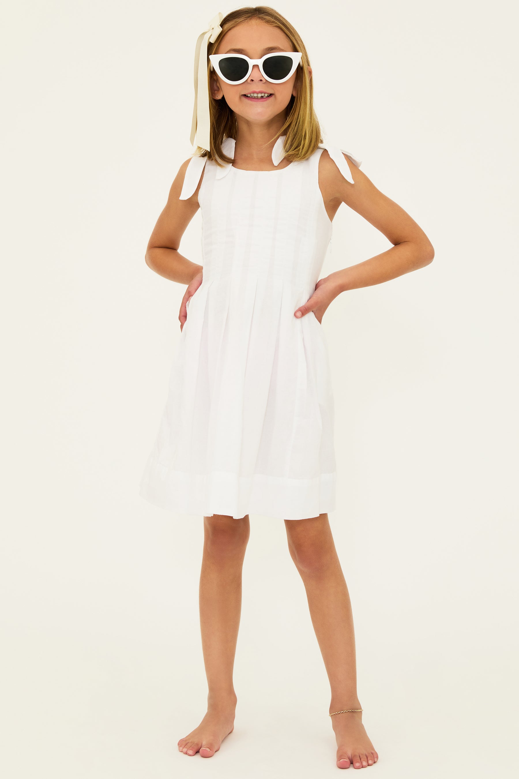 Kids' dress with tie shoulder straps in white