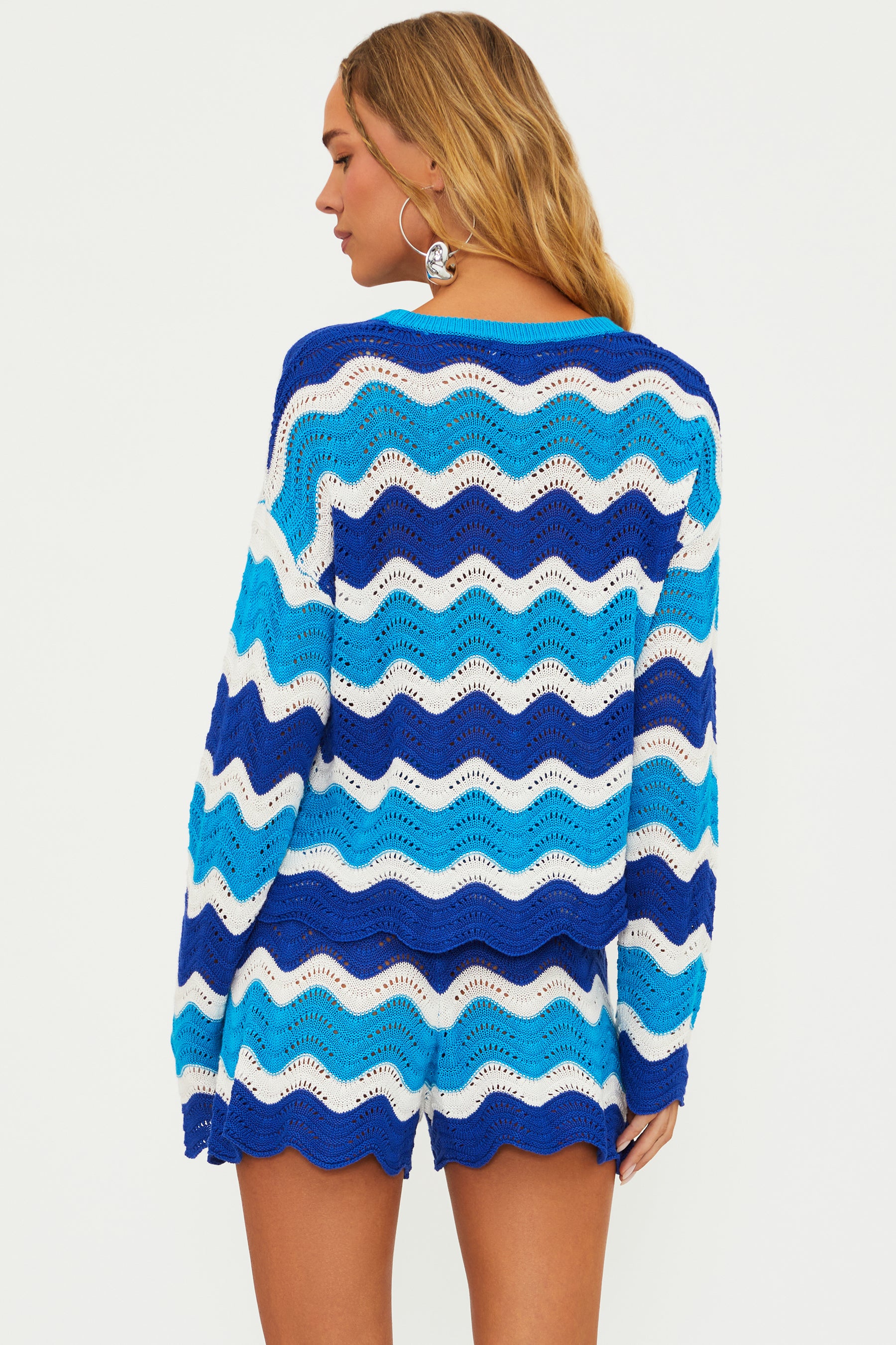 Open knit sweater with colorful wavy stripes