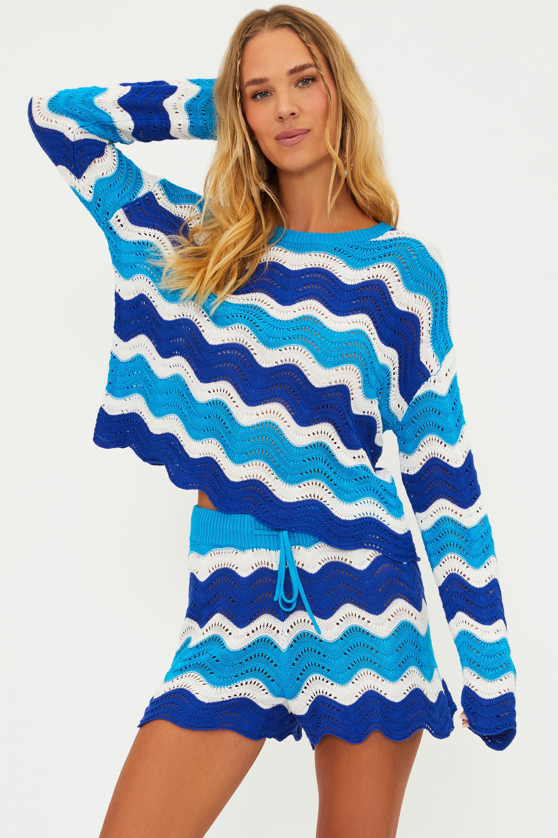 Open knit sweater with colorful wavy stripes