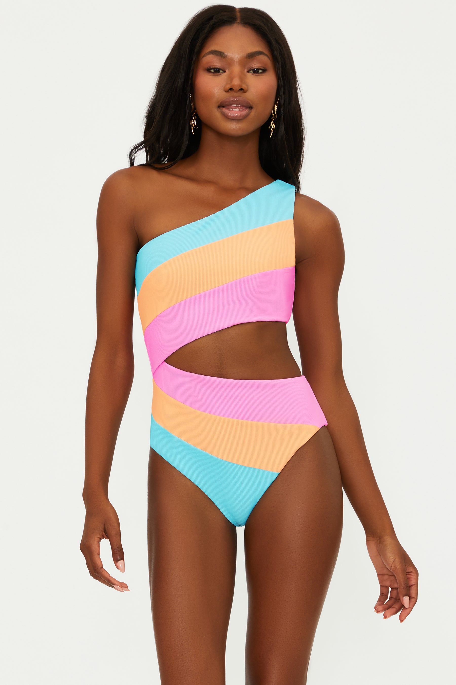 Bright multicolor one piece with an asymmetrical design featuring one shoulder strap and a side cutout