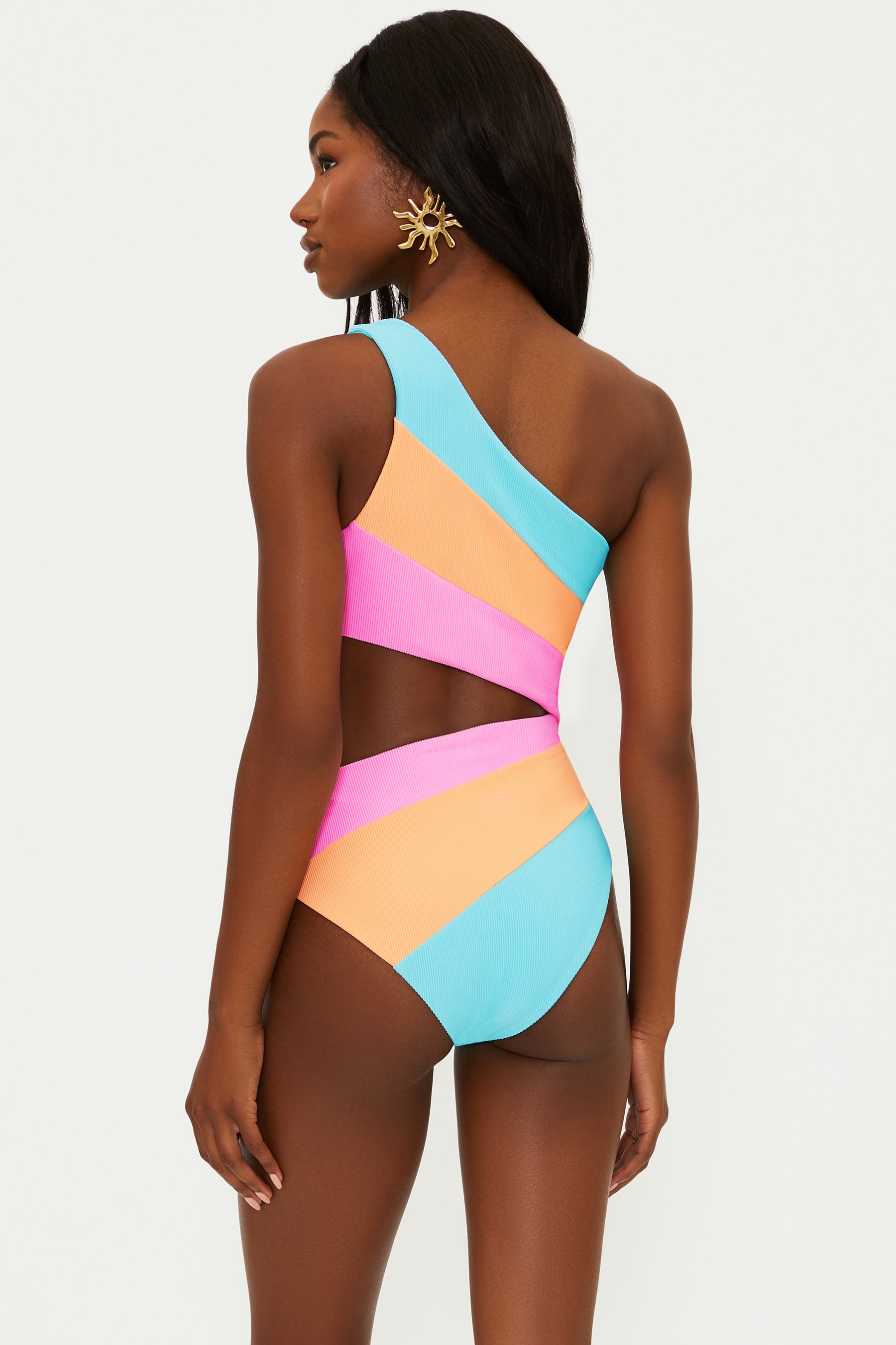 Bright multicolor one piece with an asymmetrical design featuring one shoulder strap and a side cutout