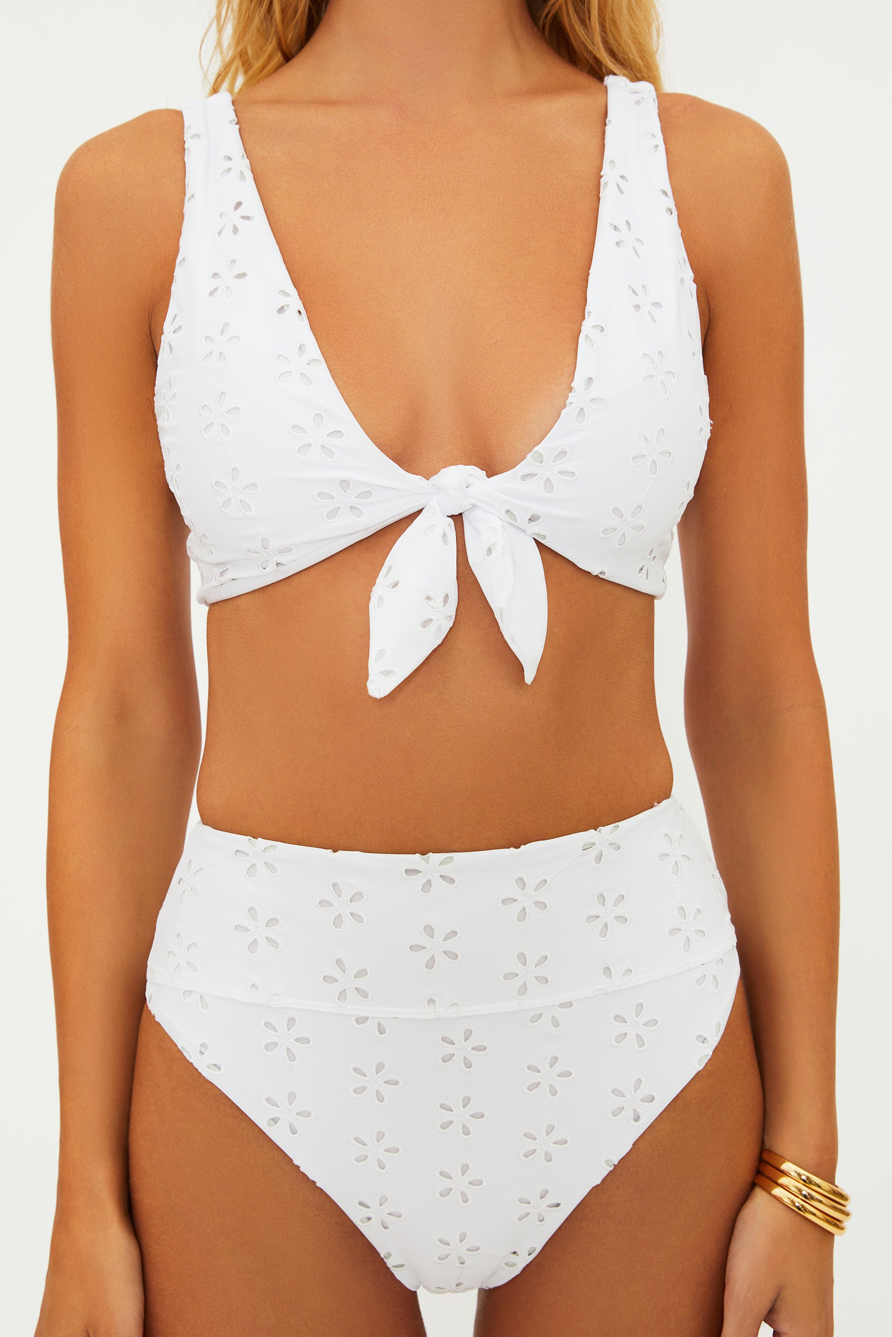 High waist bottoms with embroidered eyelet design in white