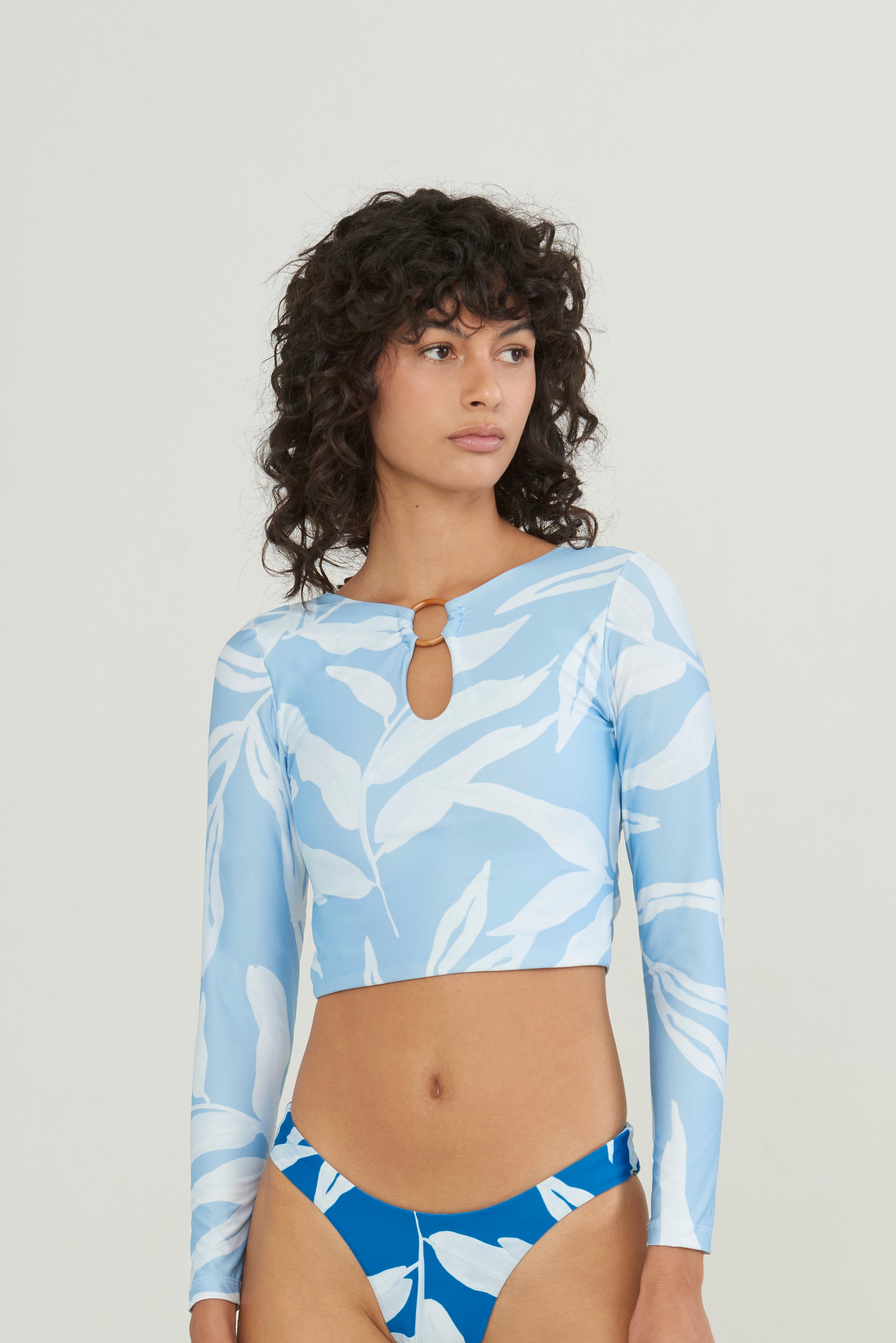 blue and white long sleeve swimsuit crop top