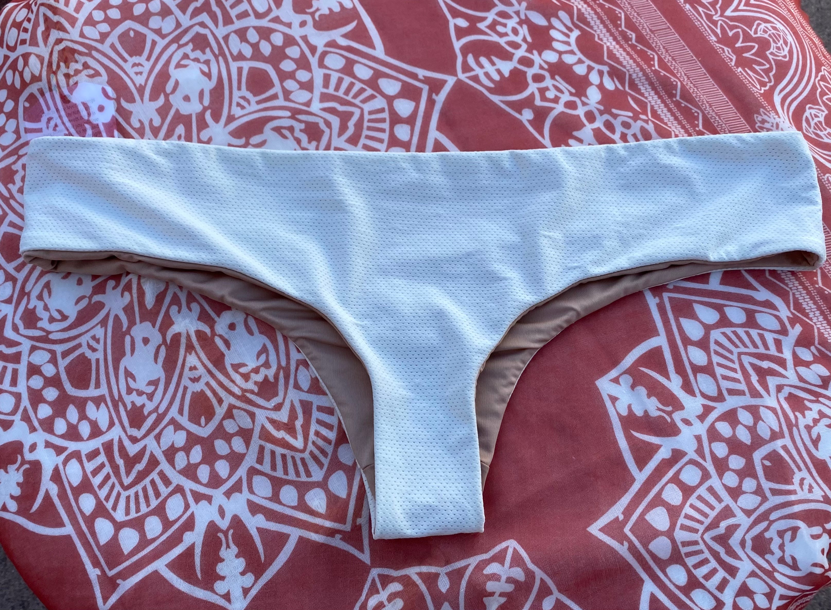 White bikini bottoms with textured fabric