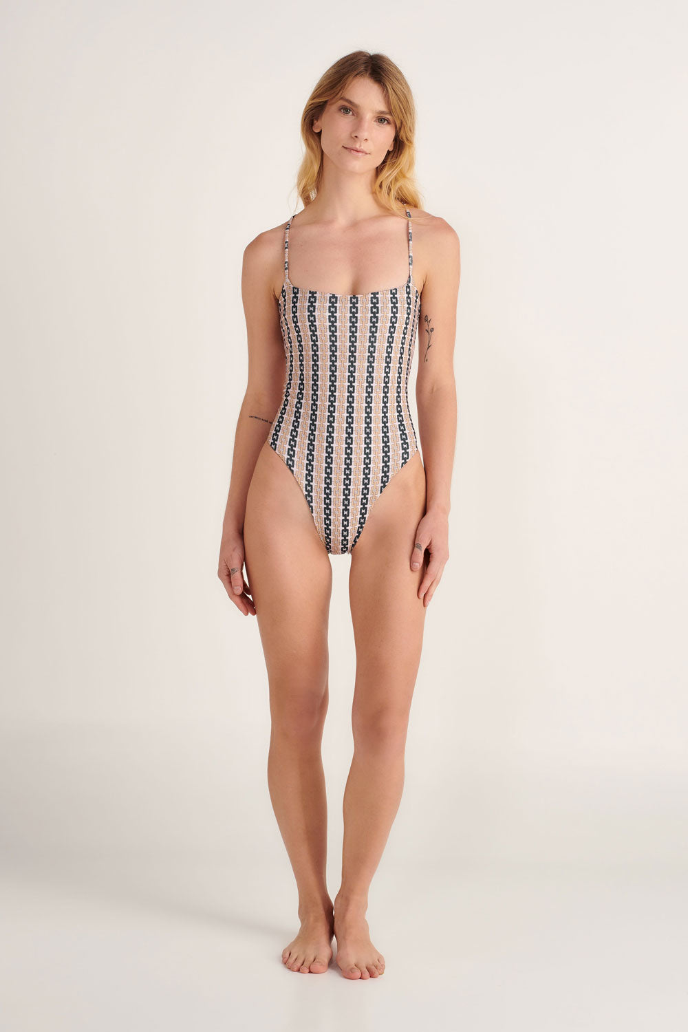 yelow and black chain link print one piece with square neck and high leg cut