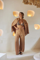 Long flowy pants with elastic waistband and tasseled drawstrings