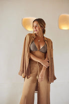 Long flowy pants with elastic waistband and tasseled drawstrings