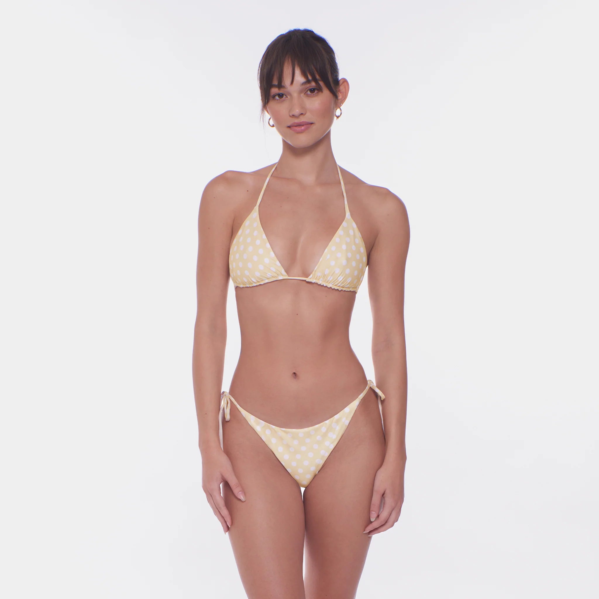 Tie side bikini bottom in yellow with white polka dots