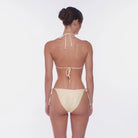 Adjustable triangle bikini top in yellow with white polka dots