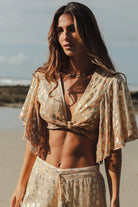 Cropped top with a twist front and a plunging neckline