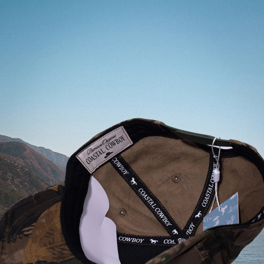 Cowgirl themed camo trucker hat