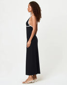 Black dress with plunging neckline and white trim