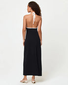 Black dress with plunging neckline and white trim