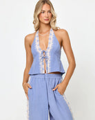 Plunging tie front top with halter neckline in light blue