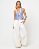 Plunging tie front top with halter ties in light blue