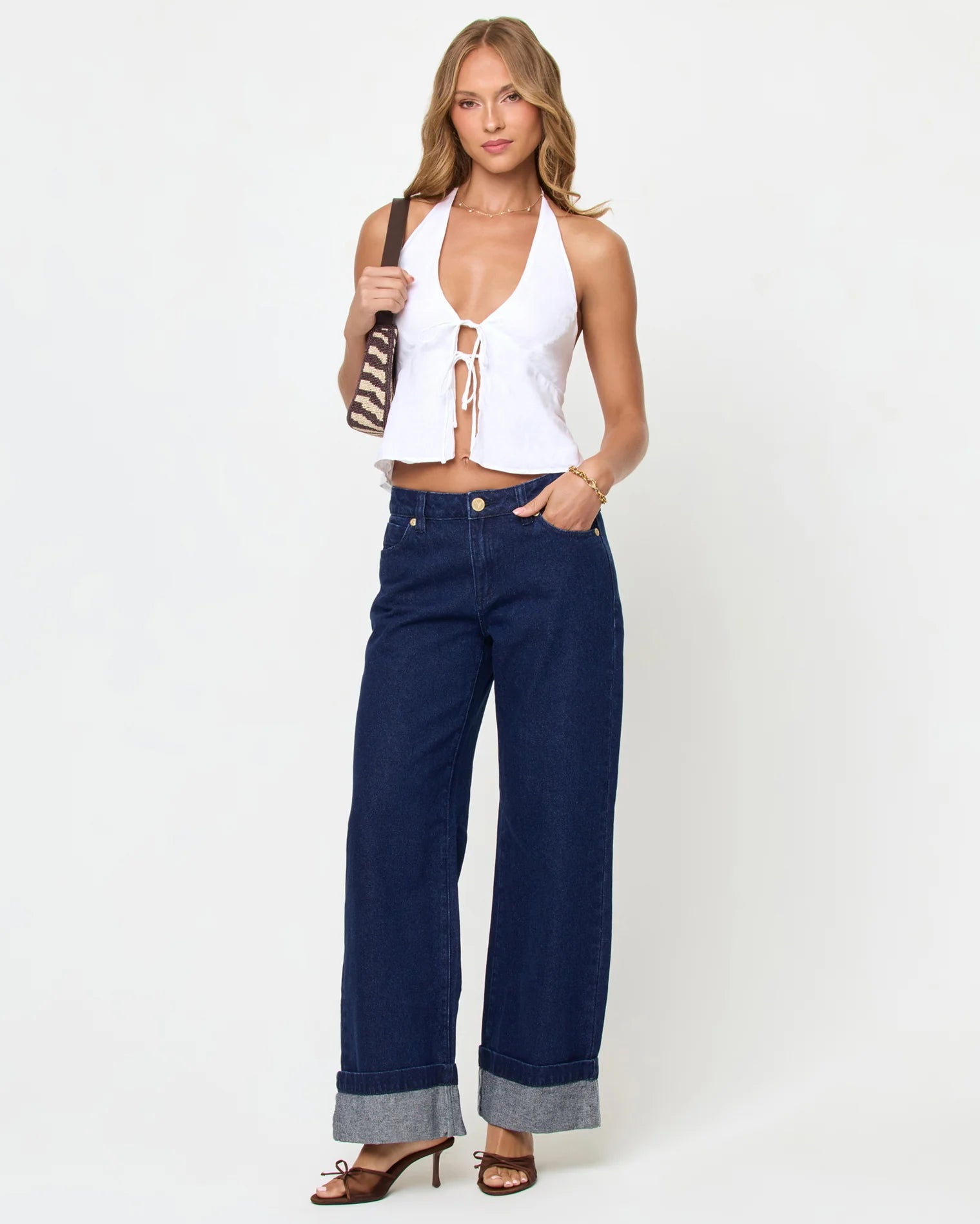 White linen crop top with a a plunging neckline and a tie front