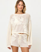 Open knit crochet cotton sweater with hibiscus print