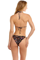 Adjustable triangle top with ruffled edges and a tie around the neck. Featuring floral print and beaded embellishment.