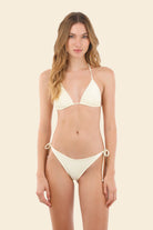 Ribbed yellow tie side bottom with back ruching and decorative shells 