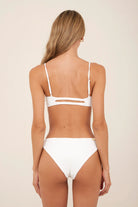 Experience ultimate comfort with this high-coverage, medium-support top