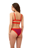 Color block bottom with strappy sides in purple and orange