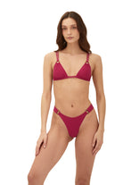 Double string triangle with adjustable shoulder straps and front rings in raspberry red