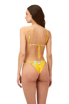 Minimal coverage bottom with ring details and side ruching in floral print