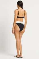 High waist bikini bottom that reverses from black to white