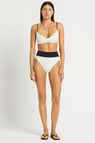 High waist bikini bottom that reverses from black to white