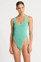 One size one piece with textured fabric and a scooped neckline in Mint