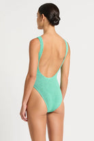 One size one piece with textured fabric and a scooped neckline in Mint
