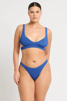One size blue bottom with modest coverage in textured crinkle fabric