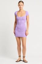 Short sleeve mini dress in one size crinkle fabric with lavender floral print