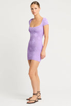 Short sleeve mini dress in one size crinkle fabric with lavender floral print