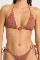 Shimmery brown triangle top with decorative ring in the front
