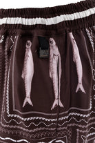 Men's swim trunks in brown and white print