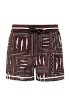Boys swim trunks in brown wih white print