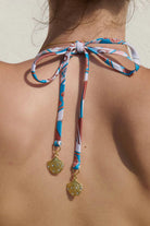 Seashell print triangle bikini top with gold hardware