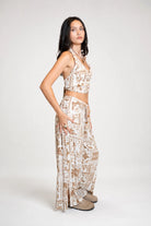 Cropped top with halter neckline in brown print