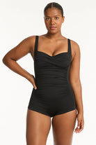Full coverage black one piece with soft cup support and boyshort coverage in the back