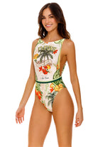 Tropical themed high neck swimsuit with floral and palm tree design 