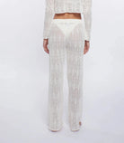 Sheer ivory coverup pants with elastic waistband