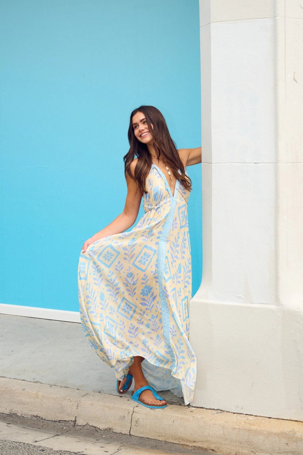 Maxi dress with plunging neckline and halter ties