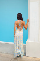 Maxi dress with plunging neckline and halter ties