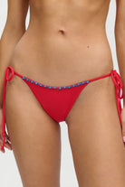 Beaded tie side bikini bottom in red