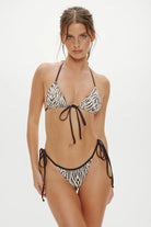 Adjustable triangle top with a tie front in brown zebra print