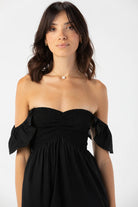 Short black dress with ruffled short sleeves