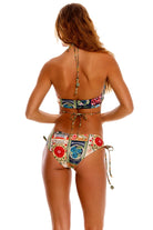 Multicolor floral print reversible bottom in a mid rise fit with tie sides