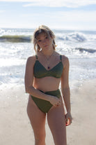 Shimmery high waist bottom with gold ring front in green