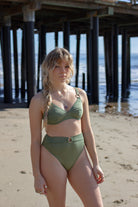 Shimmery high waist bottom with gold ring front in green